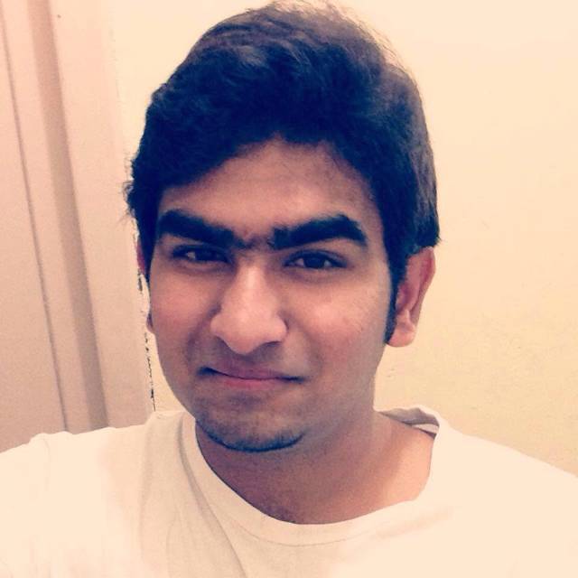 Candid smiling portrait in a white tee