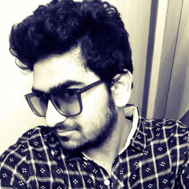 Monochrome selfie in a checked shirt and sunglasses